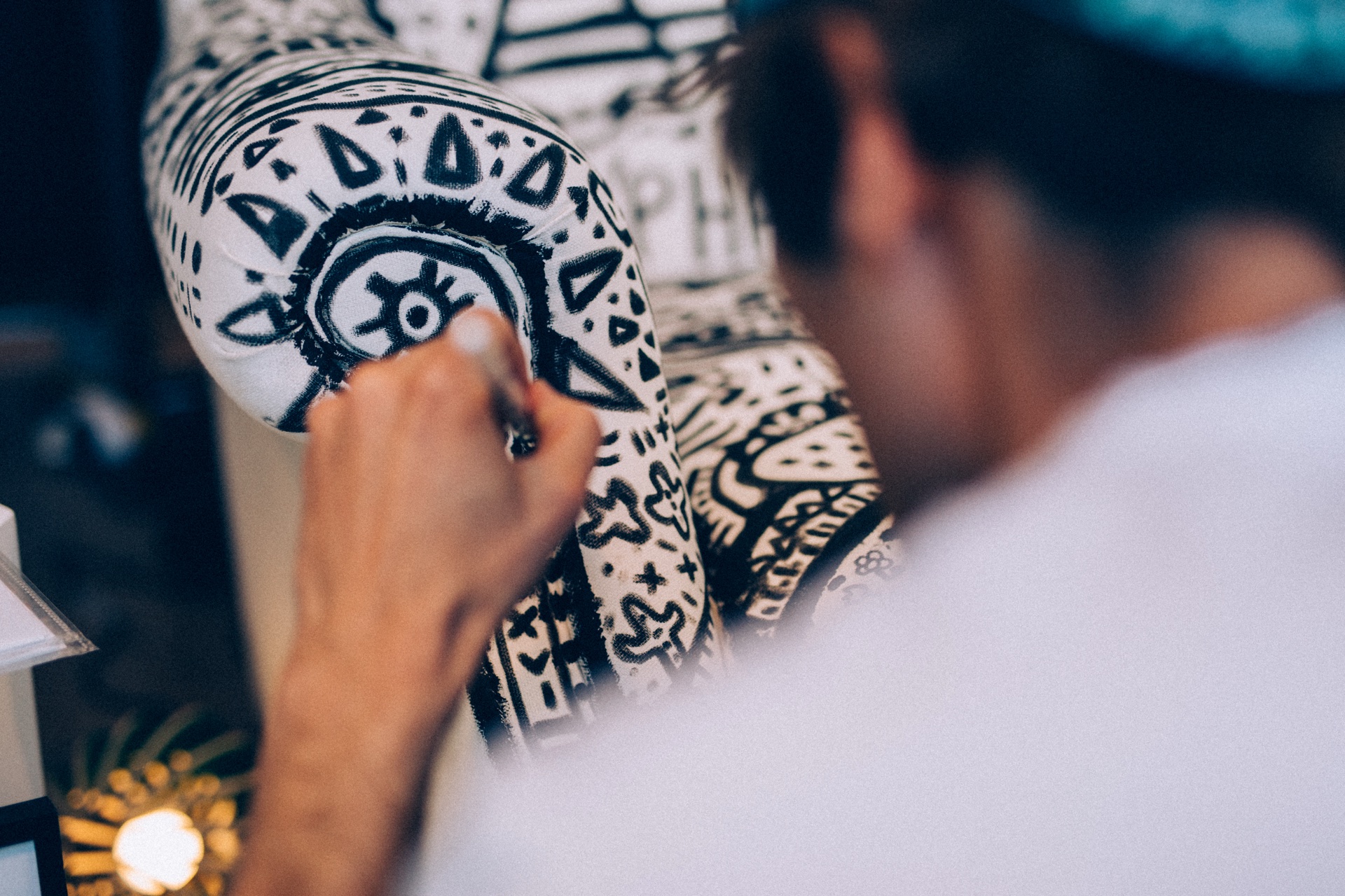 Close view of Space Raphaël painting a chair