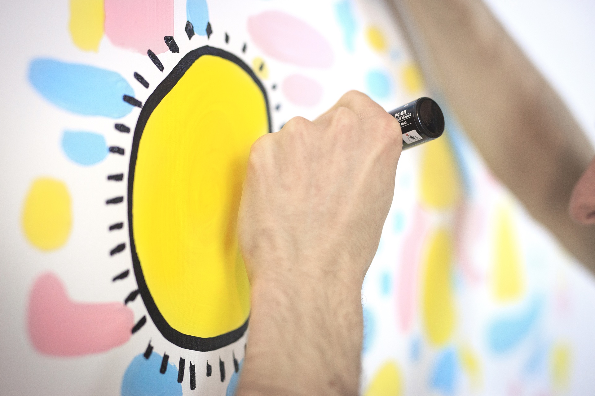 Close view of Space Raphaël drawing on a pastel artwork