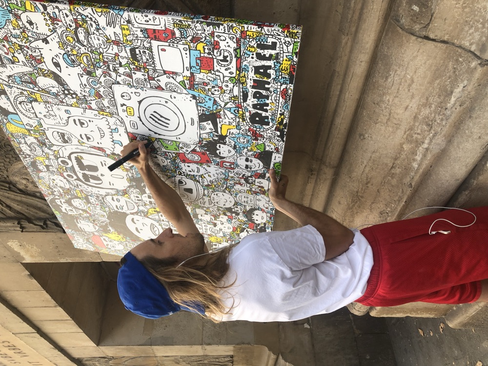 Space Raphaël painting the Tomorrow Joe artwork outdoors